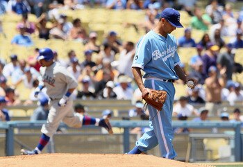 LOS ANGELES, CA - MAY 04:  Pitcher Ted Lilly #29 of the Los Angeles Dodgers looks down after giving up a solo home run to Geovany Soto of the Chicago Cubs in the fifth inning at Dodger Stadium on May 4, 2011 in Los Angeles, California. The Cubs defeated t