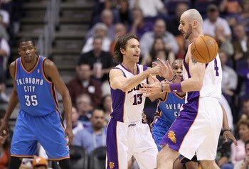 PHOENIX, AZ - MARCH 30:  Steve Nash #13 of the Phoenix Suns handles the ball during the NBA game against the Oklahoma City Thunder at US Airways Center on March 30, 2011 in Phoenix, Arizona.  The Thunder defeated the Suns 116-98. NOTE TO USER: User expres