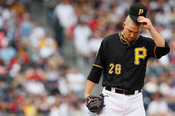 PITTSBURGH - JUNE 24:  Paul Maholm #28 of the Pittsburgh Pirates takes a moment in between pitches against the Boston Red Sox during the game on June 24, 2011 at PNC Park in Pittsburgh, Pennsylvania.  (Photo by Jared Wickerham/Getty Images)