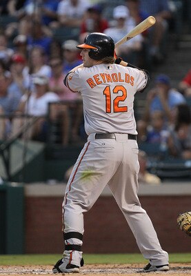 ARLINGTON, TX - JULY 06:  Mark Reynolds #12 of the Baltimore Orioles at Rangers Ballpark in Arlington on July 6, 2011 in Arlington, Texas.  (Photo by Ronald Martinez/Getty Images)