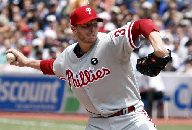 TORONTO, CANADA - JULY 2: Roy Halladay #34 of the Philadelphia Phillies throws a pitch against the Toronto Blue Jays during MLB action at The Rogers Centre July 2, 2011 in Toronto, Ontario, Canada. (Photo by Abelimages/Getty Images)