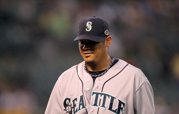 OAKLAND, CA - JULY 05:  Felix Hernandez #34 of the Seattle Mariners walks back to the dugout in between innings against the Oakland Athletics at Oakland-Alameda County Coliseum on July 5, 2011 in Oakland, California.  (Photo by Ezra Shaw/Getty Images)