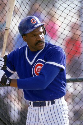 1991:  Andre Dawson #8 of the Chicago Cubs stand ready inside the batting cage during practice in 1991. (Photo by Otto Greule Jr/Getty Images)