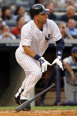 NEW YORK, NY - JULY 07:  Derek Jeter #2 of the New York Yankees hits a double in the first inning for career hit 2998 while playing against the Tampa Bay Rays at Yankee Stadium on July 7, 2011 in the Bronx borough of New York City.  (Photo by Nick Laham/G