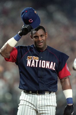 10 Jul 2000: Sammy Sosa of the Chicago Cubs and the National League Team waves to the crowd as he walks on the field during the Home Run Derby before the All-Star Baseball Game against the American League Team at Turner Field in Atlanta, Georgia.  The Ame