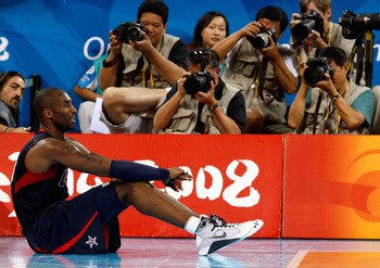 BEIJING - AUGUST 24:  Kobe Bryant #10 of the United State sits on the court in the gold medal game against Spain during Day 16 of the Beijing 2008 Olympic Games at the Beijing Olympic Basketball Gymnasium on August 24, 2008 in Beijing, China.  (Photo by S