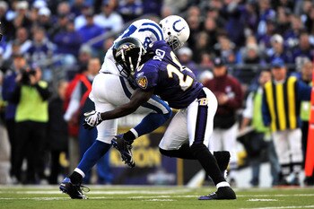 BALTIMORE - NOVEMBER 22:  Ed Reed #20 of the Baltimore Ravens stops Reggie Wayne #87 of the Indianapolis Colts at M&T Bank Stadium on November 22, 2009 in Baltimore, Maryland. The Colts defeated the Ravens 17-15. (Photo by Larry French/Getty Images)