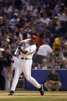 CHICAGO - JULY 14:  Garret Anderson hits during the Home Run Derby for the 74th Major League Baseball All Star Game on July 14, 2003 at US Cellular Field in Chicago, Illinois. (Photo by Matthew Stockman/Getty Images)