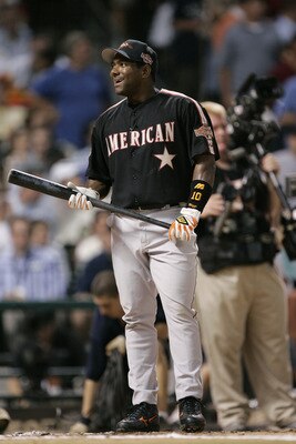 HOUSTON - JULY 12:  American League All-Star Miguel Tejada of the Baltimore Orioles smiles as he stands inside the batters box during his at bat in the Major League Baseball 2004 Century 21 Home Run Derby at Minute Maid Park on July 12, 2004 in Houston, T