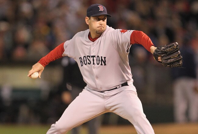 OAKLAND, CA - APRIL 19:  Dan Wheeler #35 of the Boston Red Sox in action against the Oakland Athletics at Oakland-Alameda County Coliseum on April 19, 2011 in Oakland, California.  (Photo by Ezra Shaw/Getty Images)