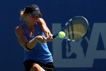 CARSON, CA - AUGUST 05:  Jill Craybas sends a backhand to Yanina Wickmayer of Belguim in the LA Women's Tennis Championships on August 5, 2009 at the Home Depot Center in Carson, California.  (Photo by Stephen Dunn/Getty Images)