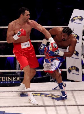 HAMBURG, GERMANY - JULY 02:  Wladimir Klitschko of Ukraine attempts a left hook on David Haye of England during their heavy weight unification match at the Imtech Arena on July 2, 2011 in Hamburg, Germany.  (Photo by Scott Heavey/Getty Images)