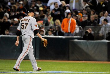 OAKLAND, CA -  JUNE 18: Jonathan Sanchez #57 of the San Francisco Giants walks back to the dugout after being taken out in the bottom of the fifth inning against the Oakland Athletics during a MLB baseball game June 18, 2011 at the Oakland-Alameda County