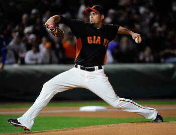 SCOTTSDALE, AZ - MARCH 07: Pitcher Jonathan Sanchez #57 of the San Francisco Giants throws a pitch against the Texas Rangers during the first inning in the first meeting between the two teams since the World Series during the spring training game at Scott