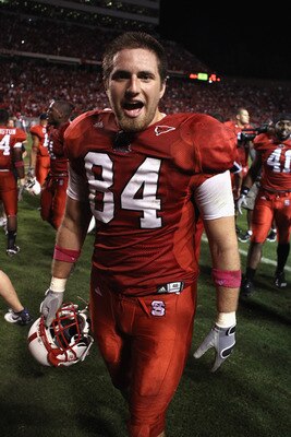 RALEIGH, NC - OCTOBER 28:  George Bryan #84 of the North Carolina State Wolfpack celebrates after a game winning touchdown and defeating the Florida State Seminoles 28-24 during their game at Carter-Finley Stadium on October 28, 2010 in Raleigh, North Car