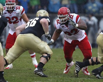 SOUTH BEND, IN - NOVEMBER 13: Star Lotulelei #92 of the Utah Utes rushes against Chris Watt #66 of the Notre Dame Fighting Irish at Notre Dame Stadium on November 13, 2010 in South Bend, Indiana. Notre Dame defeated Utah 28-3. (Photo by Jonathan Daniel/Ge