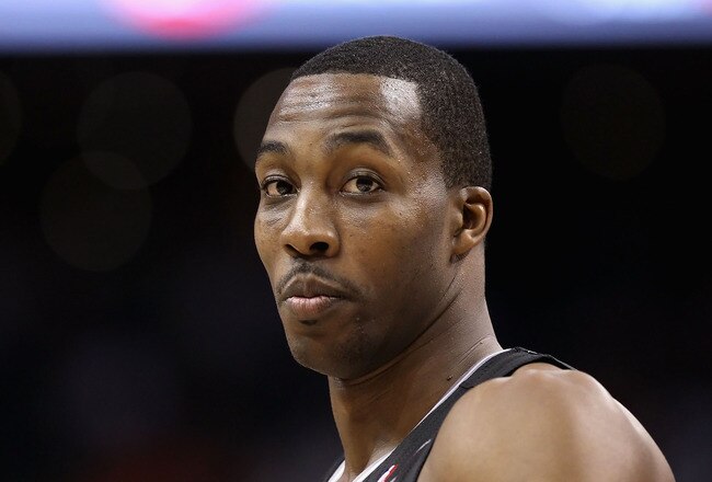 PHOENIX, AZ - MARCH 13:  Dwight Howard #12 of the Orlando Magic during the NBA game against the Phoenix Suns at US Airways Center on March 13, 2011 in Phoenix, Arizona. The Magic defeated the Suns 111-88. NOTE TO USER: User expressly acknowledges and agre