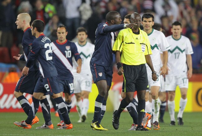JOHANNESBURG, SOUTH AFRICA - JUNE 18:  Jozy Altidore of the United States argues with referee Koman Coulibaly after the 2010 FIFA World Cup South Africa Group C match between Slovenia and USA at Ellis Park Stadium on June 18, 2010 in Johannesburg, South A