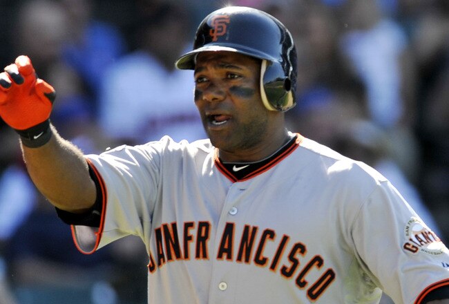 CHICAGO, IL - JUNE 28:  Miguel Tejada #10 of the San Francisco Giants reacts after hitting a solo homer in the ninth inning against the Chicago Cubs during the first game of a doubleheader on June 28, 2011 at Wrigley Field in Chicago, Illinois.  (Photo by