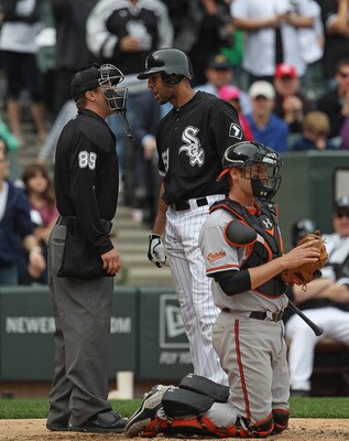 CHICAGO, IL - MAY 01: Alex Rios #51 of the Chicago White Sox argues with home plate umpire Cory Blaser #89 after being called out on stikes in the 9th inning as Matt Wieters #32 of the Baltimore Orioles looks to the mound at U.S. Cellular Field on May 1,