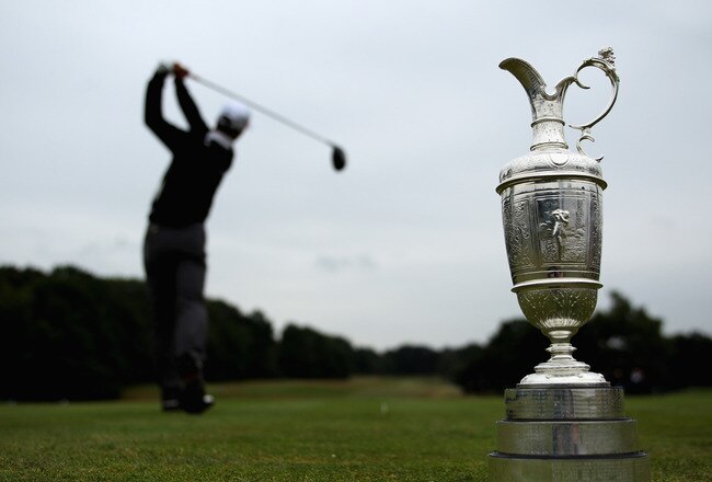 SUNNINGDALE, ENGLAND - JUNE 06:  A player tees off as the Claret Jug is displayed during The Open Championship Europe International Final Qualifying at Sunningdale Golf Club on June 6, 2011 in Sunningdale, England.  (Photo by Warren Little/Getty Images)