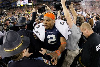 GLENDALE, AZ - JANUARY 10:  Quarterback Cameron Newton #2 of the Auburn Tigers celebrates the Tigers 22-19 victory against the Oregon Ducks in the Tostitos BCS National Championship Game at University of Phoenix Stadium on January 10, 2011 in Glendale, Ar