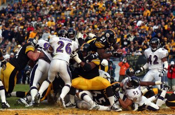 20 Jan 2002 : Amos Zereoue #21 of the Pittsburgh Steelers attempts to break from a pile up against the Baltimore Ravens during the AFC divisional playoff game at Heinz Field in Pittsburgh, Pennsylvania. The Steelers won 27-10. DIGITAL IMAGE. Mandatory Cre