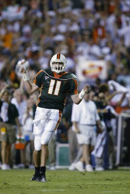 MIAMI - SEPTEMBER 21:  Quarterback Ken Dorsey #11  of Miami celebrates a touchdown against Boston College during the game on September 21, 2002 at the Orange Bowl in Miami, Florida.  Miami defeated Boston College 38-6.  (Photo by Andy Lyons/Getty Images)