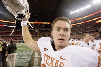 ARLINGTON, TX - DECEMBER 5: Quarterback Colt McCoy #12 of the Texas Longhorns celebates after his teams 10-6 victory over the Nebraska Cornhuskers in the game at Cowboys Stadium on December 5, 2009 in Arlington, Texas. (Photo by Jamie Squire/Getty Images)