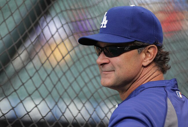 DENVER, CO - JUNE 10:  Manager Don Mattingly of the Los Angeles Dodgers looks on during batting practice prior to facing the Colorado Rockies at Coors Field on June 10, 2011 in Denver, Colorado.  (Photo by Doug Pensinger/Getty Images)