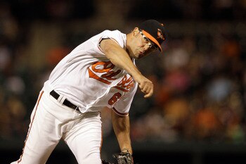 BALTIMORE, MD - JUNE 29:  Relief pitcher Kevin Gregg #63 of the Baltimore Orioles delivers to a St. Louis Cardinals batter at Oriole Park at Camden Yards on June 29, 2011 in Baltimore, Maryland.  (Photo by Rob Carr/Getty Images)