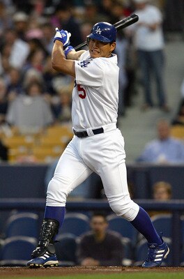 LOS ANGELES - APRIL 13:  Hee-Seop Choi #5 of the Los Angeles Dodgers hits a single against the San Francisco Giants in the first inning on April 13, 2004 at Dodger Stadium in Los Angeles, California.  (Photo by Lisa Blumenfeld/Getty Images)