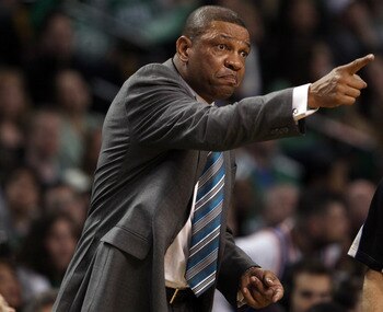 BOSTON, MA - APRIL 19:  Doc Rivers of the Boston Celtics directs his players in the second half against the New York Knicks in Game Two of the Eastern Conference Quarterfinals in the 2011 NBA Playoffs on April 19, 2011 at the TD Garden in Boston, Massachu
