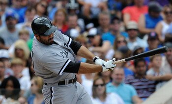 CHICAGO, IL - JULY 03: Carlos Quentin #20 of the Chicago White Sox  bats against the Chicago Cubs on July 3, 2011 at Wrigley Field in Chicago, Illinois. Quentin was selected to the 2011 American League All Star Team.  (Photo by David Banks/Getty Images)