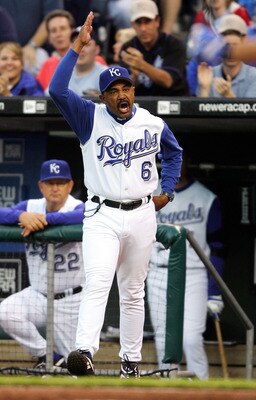 KANSAS CITY, MO - APRIL 15:  Manager Tony Pena of the Kansas City Royals argues with home plate umpire C.B. Bucknor in the first inning against the Detroit Tigers on April 15, 2005 at Kauffman Stadium in Kansas City, Missouri.  (Photo by Elsa/Getty Images
