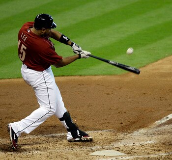 HOUSTON - JUNE 26:  Carlos Lee #45 of the Houston Astros doubles off the left field wall in the third inning against the Tampa Bay Rays at Minute Maid Park on June 26, 2011 in Houston, Texas.  (Photo by Bob Levey/Getty Images)