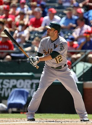 ARLINGTON, TX - JULY 10:  David DeJesus #12 of the Oakland Athletics at Rangers Ballpark in Arlington on July 10, 2011 in Arlington, Texas.  (Photo by Ronald Martinez/Getty Images)