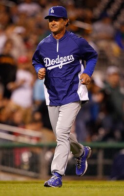PITTSBURGH - MAY 09:  Manager Don Mattingly #8 of the Los Angeles Dodgers jogs back to the dugout after arguing with umpire Mike DiMuro during the game against the Pittsburgh Pirates on May 9, 2011 at PNC Park in Pittsburgh, Pennsylvania.  (Photo by Jared