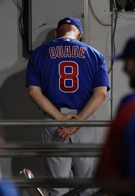 CHICAGO, IL - JUNE 20: Manager Mike Quade #8 of the Chicago Cubs is lost in thought during a game against the Chicago White Sox at U.S. Cellular Field on June 20, 2011 in Chicago, Illinois. The Cubs defeated the White Sox 6-3. (Photo by Jonathan Daniel/Ge