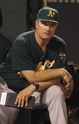 BALTIMORE, MD - JUNE 08:  Manager Bob Geren #17 of the Oakland Athletics in the dugout during the ninth inning of the Athletics loss to the Baltimore Orioles at Oriole Park at Camden Yards on June 8, 2011 in Baltimore, Maryland.  (Photo by Rob Carr/Getty