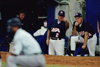 SYDNEY - SEPTEMBER 27:  Team Manager Tommy Lasorda of the USA discusses play with pitching coach Phil Regan during the finals game against Cuba at the Baseball Stadium in Olympic Park during the Sydney Olympic Games in Sydney, Australia on September 27, 2