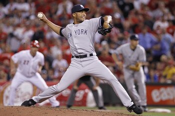 CINCINNATI, OH - JUNE 20: Mariano Rivera #42 of the New York Yankees pitches in the ninth inning against the Cincinnati Reds at Great American Ball Park on June 20, 2011 in Cincinnati, Ohio. The Yankees defeated the Reds 5-3. (Photo by Joe Robbins/Getty I