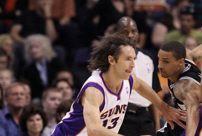 PHOENIX, AZ - APRIL 13:  Steve Nash #13 of the Phoenix Suns drives the ball during the NBA game against the San Antonio Spurs at US Airways Center on April 13, 2011 in Phoenix, Arizona.  NOTE TO USER: User expressly acknowledges and agrees that, by downlo
