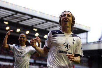 LIVERPOOL, ENGLAND - MAY 15:  Luka Modric of Spurs celebrates after scoring his team's second goal from the penalty spot during the Barclays Premier League match between Liverpool and Tottenham Hotspur at Anfield on May 15, 2011 in Liverpool, England.  (P
