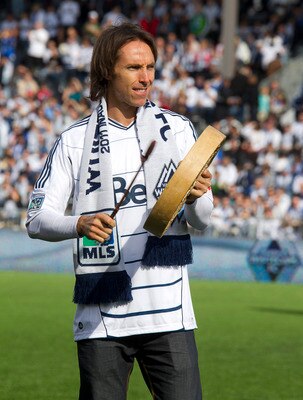 VANCOUVER, BC - MARCH 19:  NBA star Steve Nash  of the Phoenix Suns and part owner of the Vancouver Whitecaps beats a drum before the match against Toronto FC March 19, 2011 in Vancouver, British Columbia, Canada.  (Photo by Jeff Vinnick/Getty Images)