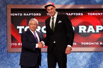 NEWARK, NJ - JUNE 23:  Jonas Valanciunas (R) from Utena, Lithuania greets NBA Commissioner David Stern after he was picked #5 overall by the Toronto Raptors in the first round during the 2011 NBA Draft at the Prudential Center on June 23, 2011 in Newark,