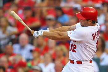 ST. LOUIS, MO - JULY 9: Lance Berkman #12 of the St. Louis Cardinals looses his bat against the Arizona Diamondbacks at Busch Stadium on July 9, 2011 in St. Louis, Missouri.  (Photo by Dilip Vishwanat/Getty Images)