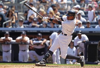 NEW YORK, NY - JULY 10:  Curtis Granderson #14 of the New York Yankees against the Tampa Bay Rays at Yankee Stadium on July 10, 2011 in the Bronx borough of New York City.  (Photo by Nick Laham/Getty Images)