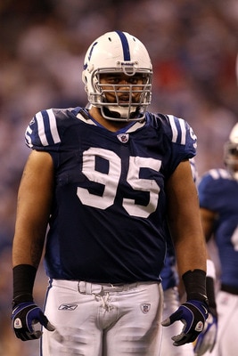 INDIANAPOLIS, IN - JANUARY 08:  Fili Moala #95 of the Indianapolis Colts looks on against the New York Jets during their 2011 AFC wild card playoff game at Lucas Oil Stadium on January 8, 2011 in Indianapolis, Indiana. The Jets won 17-16.  (Photo by Jonat