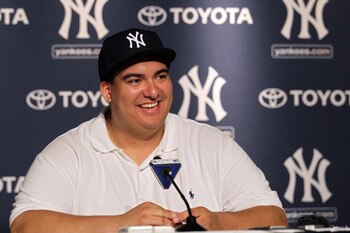 NEW YORK, NY - JULY 09:  New York Yankees fan Christian Lopez speaks to the media after catching a home run which was the 3000th hit of Derek Jeter career at Yankee Stadium on July 9, 2011 in the Bronx borough of New York City.  (Photo by Nick Laham/Getty